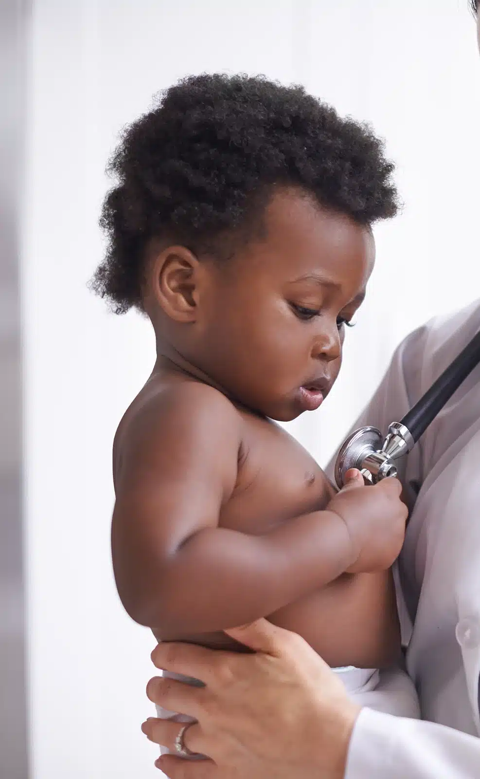 cropped-shot-of-a-female-pediatrician-doing-a-chec-2023-11-27-05-13-28-utc